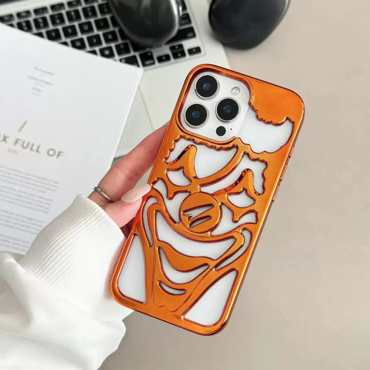 Electroplating frosted hollow clown phone case