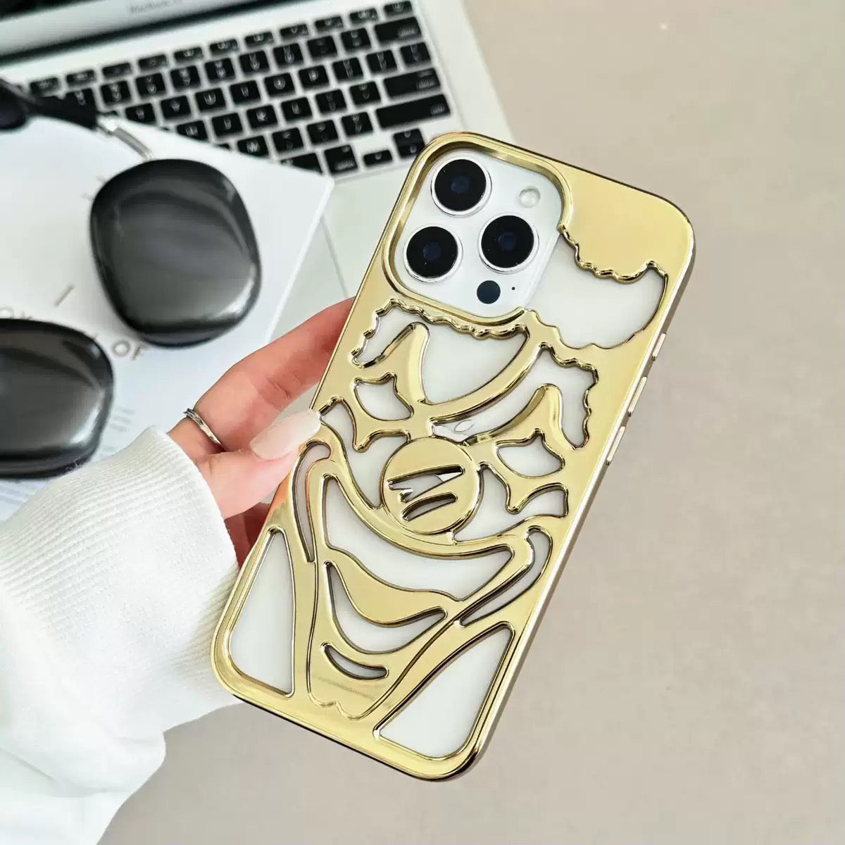Electroplating frosted hollow clown phone case